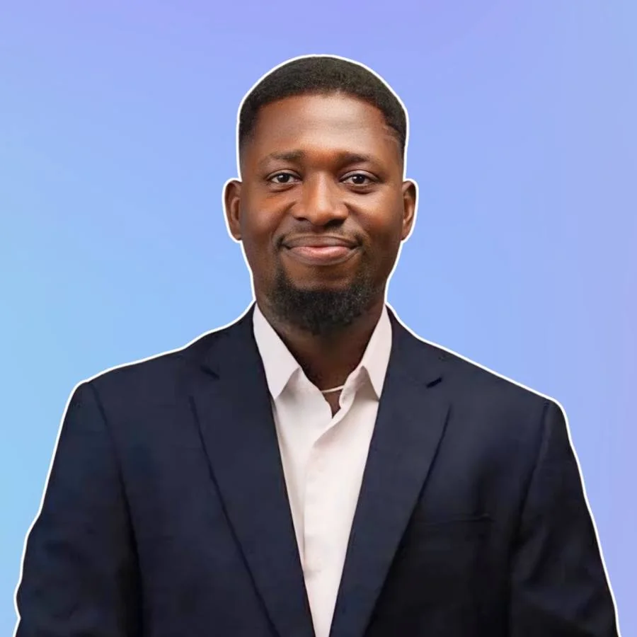 Johnson Oke in a navy suit